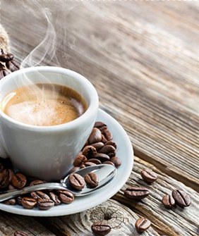 Espresso cup with crema on a raw wooden table