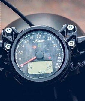 Close-up of the analog speedometer of an Indian motorcycle